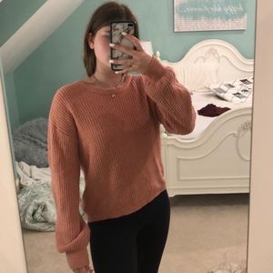 a new day sweater with bow in back